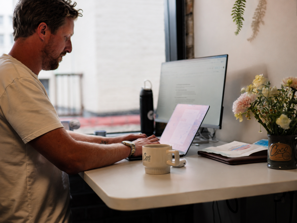Private office member at desk coco mugs