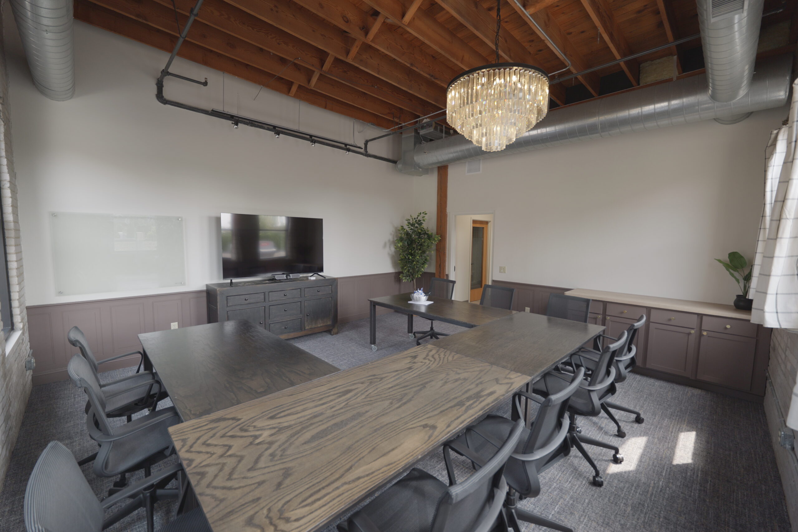 Stone Arch conference room inside the renovated Coco Northeast Minneapolis location
